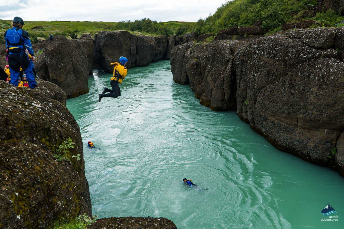 Jumping into the Gullfoss river in Iceland