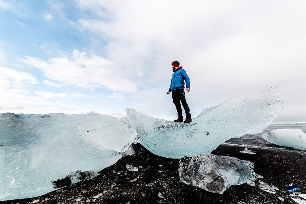 Guide playing at The Diamond Beach Iceland
