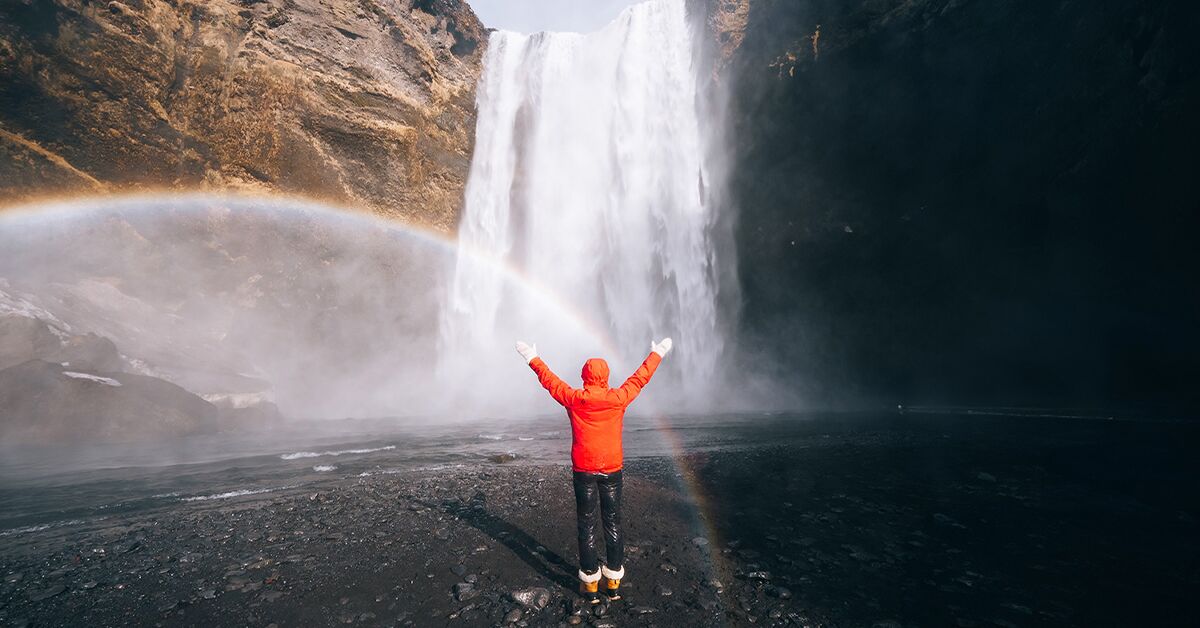 person in front Skogarfoss