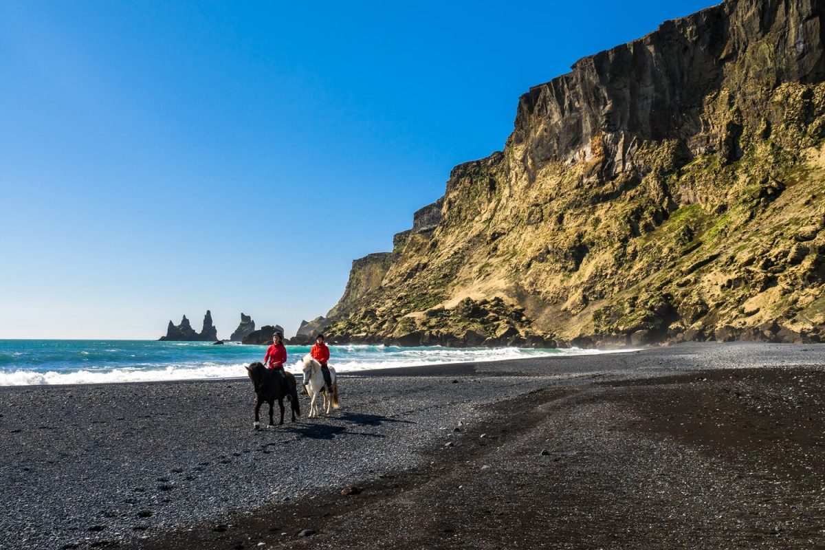 black sand beach horse riding